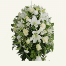 Casket Cover of Seasonal Flowers and foliage. Neutrals colours whites, creams, lemons, greens.