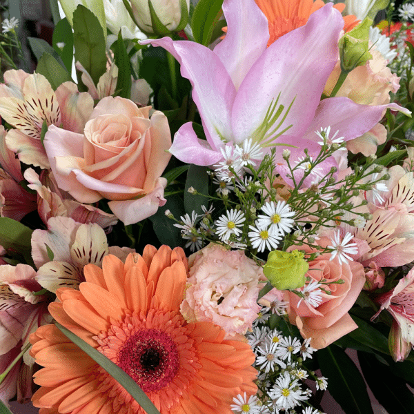 Florist choice flower bouquet. Seasonal mix of fresh flowers & foliage.