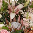 Florist choice flower bouquet. Seasonal mix of fresh flowers & foliage.