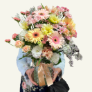 Blossom-Vase-Whangarei-pastel-seasonal-flower-arrangement-in-clear-dimpled-glass-vase.png