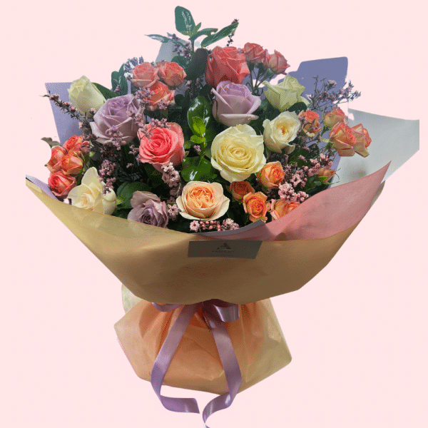 Rainbow Rose Collection bouquet with pastel roses in pink, peach, cream and lavender tones by Amber-Lee Florist Whangārei