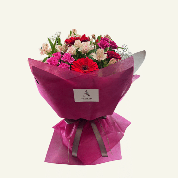 Sugar plum flower bouquet, fresh flowers beautifully wrapped.
